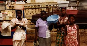 Girls selling ice water.