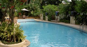 The pool looks inviting, but it's 10 feet from the noise of the street