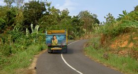 The woman on the truck is the "Ocean Queen" who lures people to their deaths in the ocean