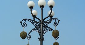 Plastic durian fruits hanging from a lamppost. Why? Why not!