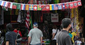 (From left to right) Serbia, Paraguay, Poland, Portugal, Saudi Arabia, Holland, Spain, Sweden, Switzerland, Togo, Trinidad and Tobago, Tunisia, Ukraine, USA, Cuba, Cambodia, Nazi Germany, Nazi Germany Nazi Germany, Nazi Germany. The fascist flag count is 11, I believe.