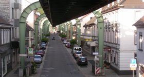 The whole line is suspended over the main street and the river